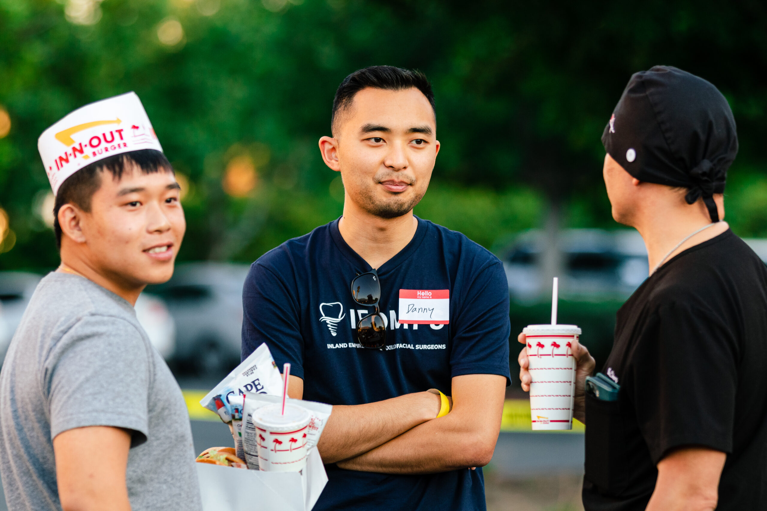 IEOMFS team at community event educating about impacted canine treatment options