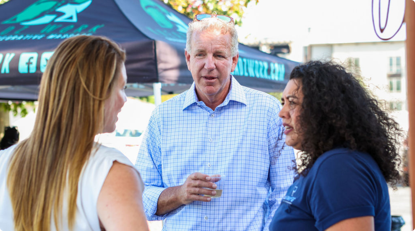 Doctors and staff networking at IEOMFS social event