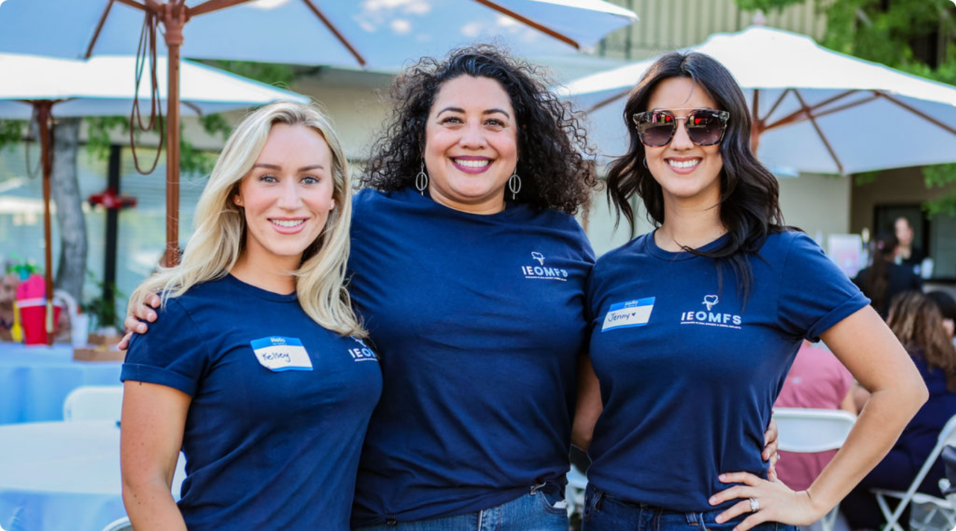 IEOMFS staff celebrating at social gathering